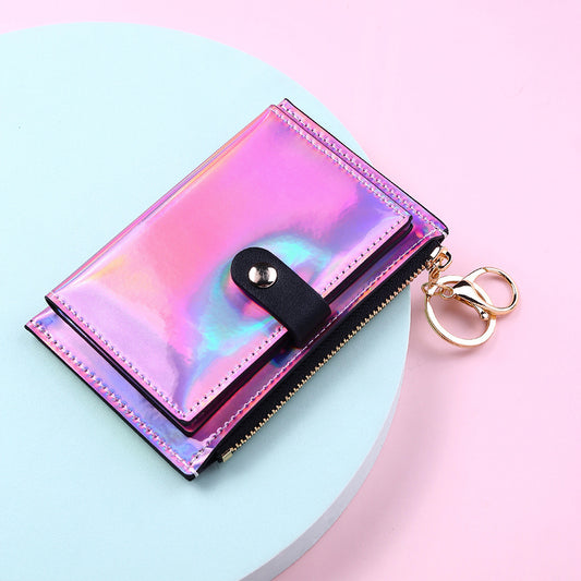 Front view of a laser holographic zipper wallet for women showing its reflective surface.