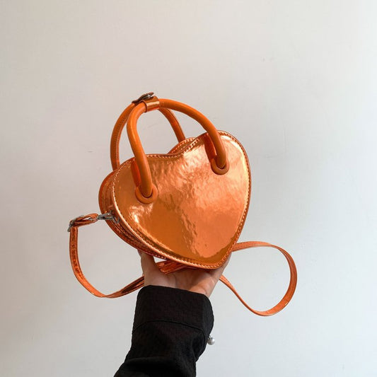 Front view of the women's fashion shoulder messenger bag on a clean background
