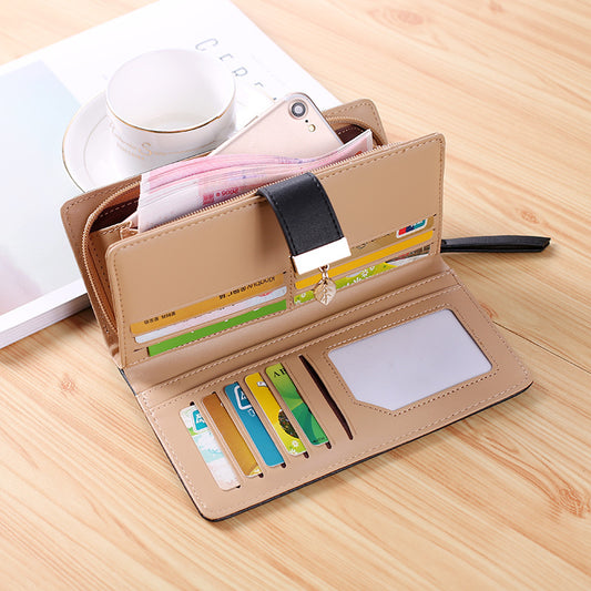 Front view of the women's long leaf cutout clutch wallet shown flat